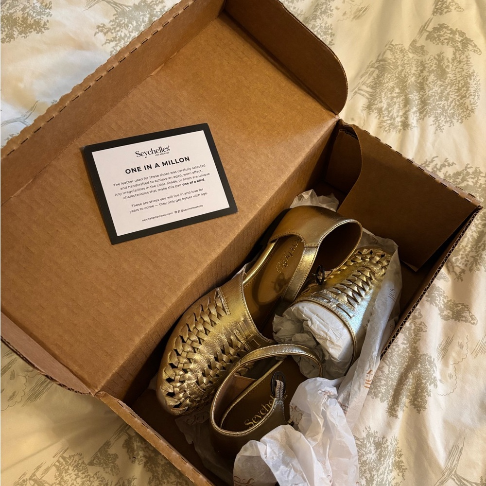 Anthropologie Seychelles Gold leather Flats with Metallic Accents